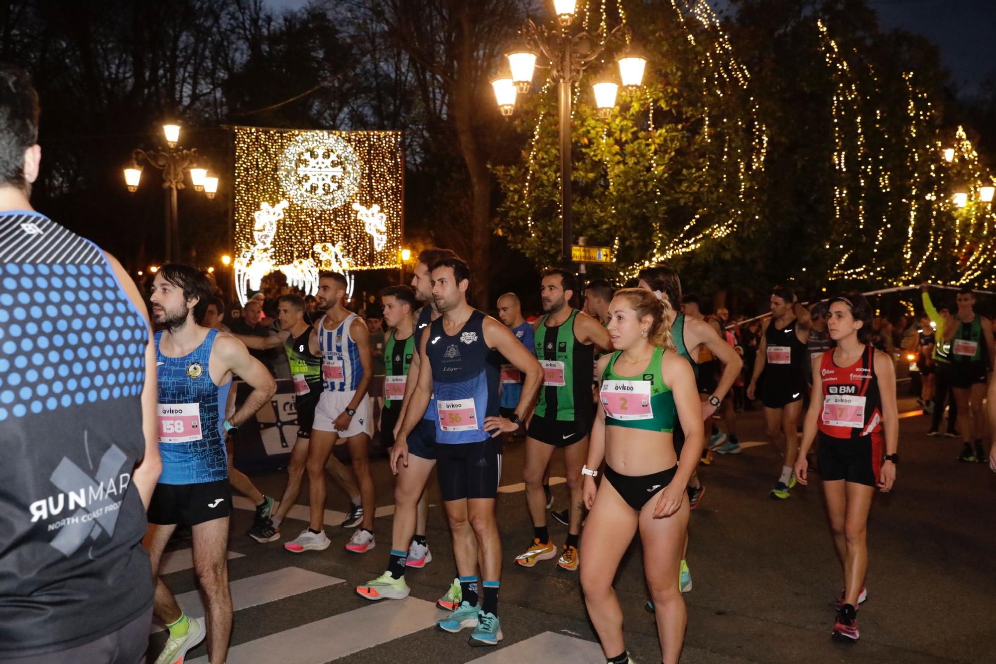 En imágenes: Jaime Bueno (Univerisad de Oviedo) y Mariam Benkert triunfan en la San Silvestre de Oviedo