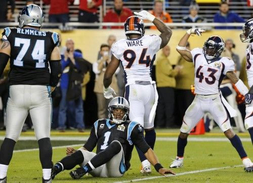 Denver Broncos' Ware and Ward celebrate after sacking Panthers' quarterback Newton in the fourth quarter of the NFL's Super Bowl 50 football game in Santa Clara