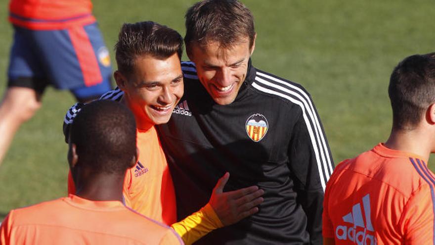 Fran Villalba, con Phil Neville