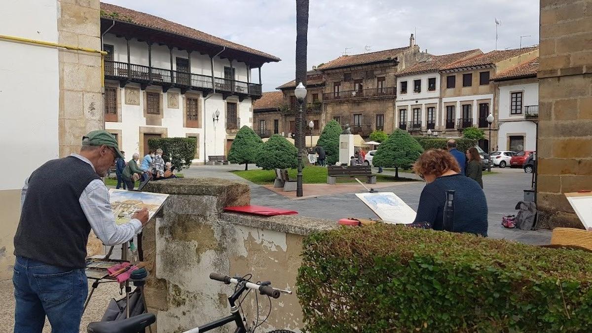 Acuarelistas, pintando en las calles de Villaviciosa.