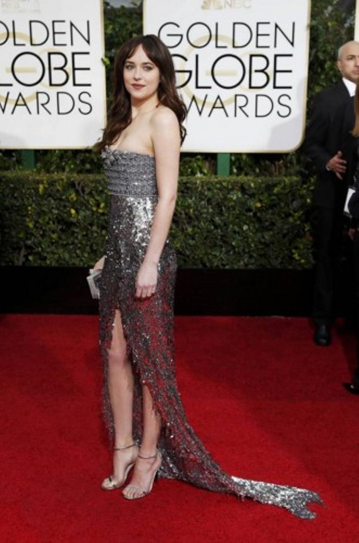 Dakota Johnson arrives at the 72nd Golden Globe Awards in Beverly Hills