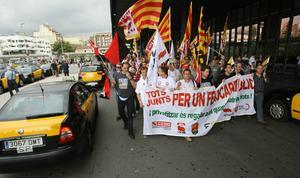 Treballadors del transport públic es manifesten en contra de les retallades.