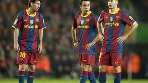 Messi, Xavi e Iniesta, en una foto de archivo