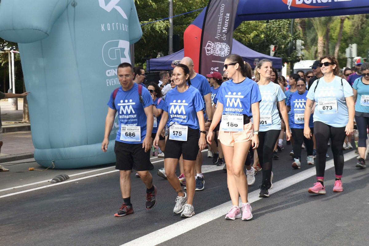 La carrera y marcha Solidaria Asteamur, en imágenes