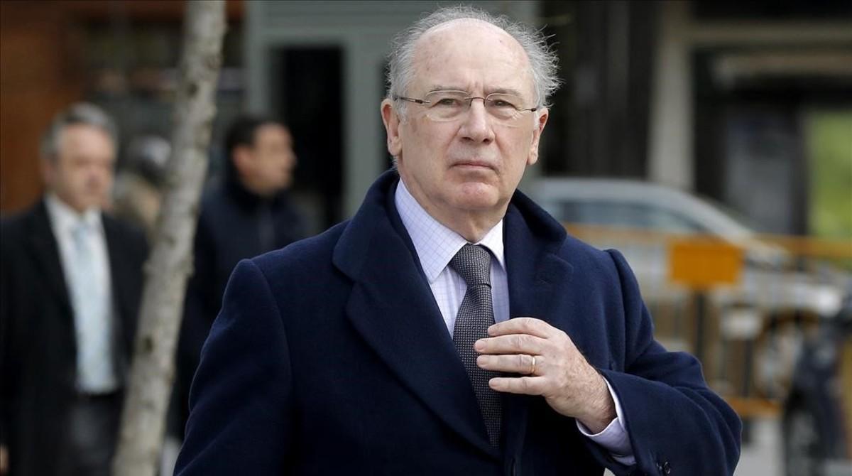 Rato, a su llegada a la Audiencia Nacional, imputado en varias causas.