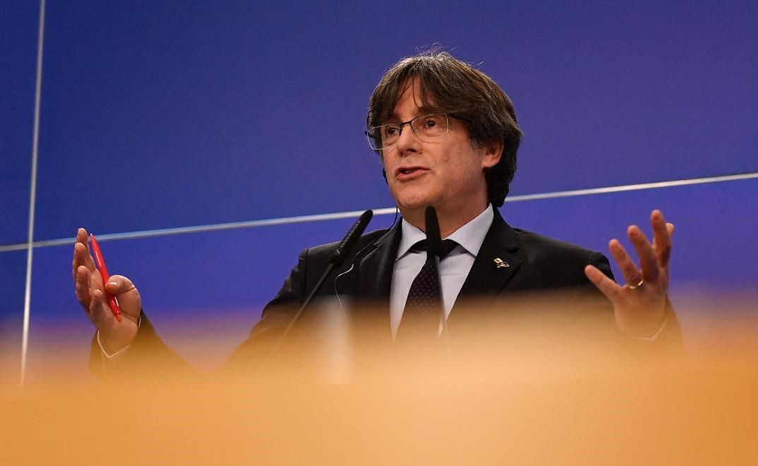 Exiled former Catalan leader and member of European ParliamentCarles Puigdemont speaks during a press conference at the EU Parliament in Brussels on March 9  2021  after the European Parliament lifted his  immunity  along with two fellow Catalan MEP s  as they are wanted by Spain for sedition over the organisation of a banned separatist referendum in 2017  (Photo by JOHN THYS   AFP)