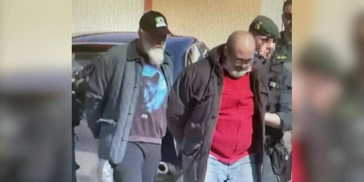 Los dos detenidos por el asesinato de Francisca Cadenas, custodiados por agentes de la UCO.