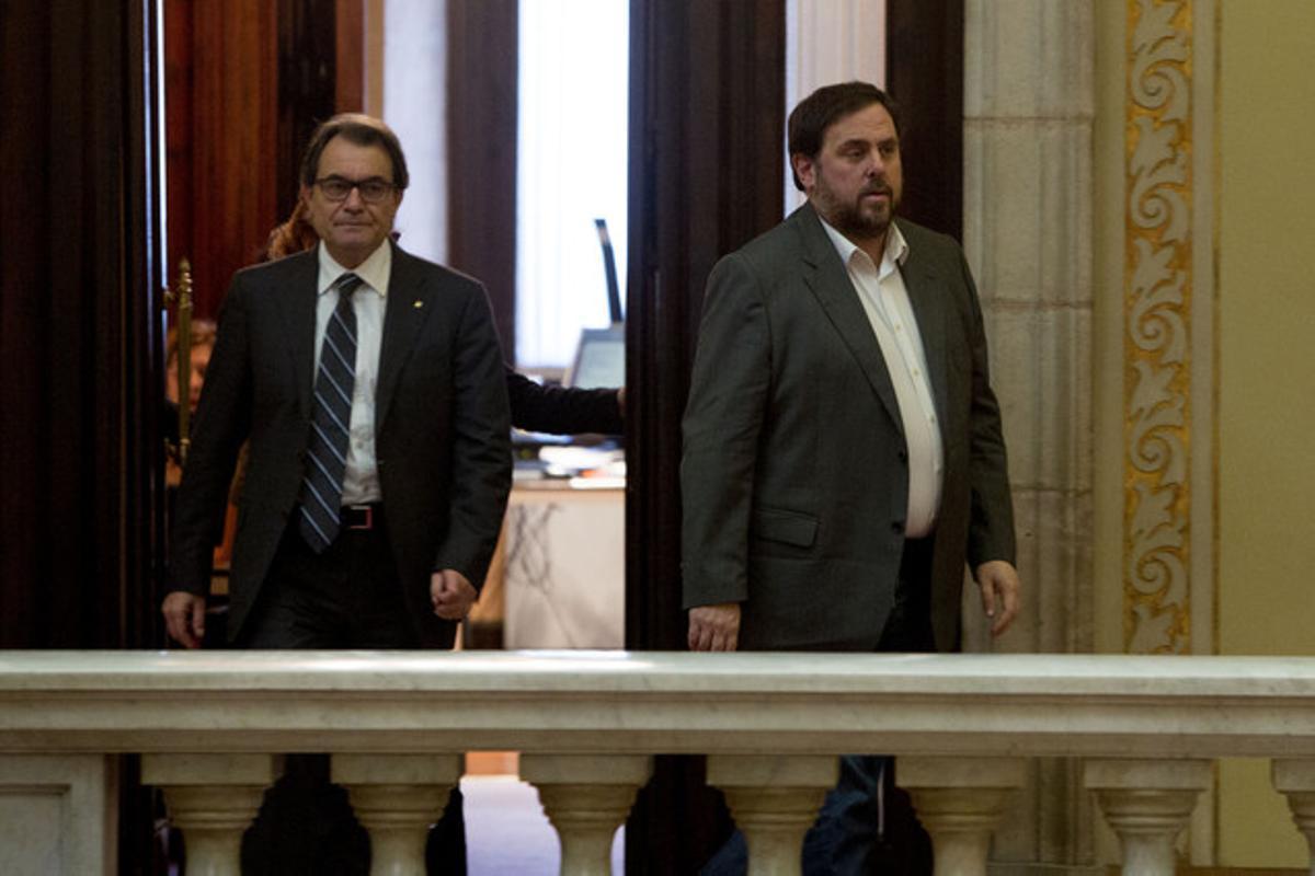 Artur Mas y Oriol Junqueras salen del despacho del 'president' en el Parlament, el pasado diciembre.