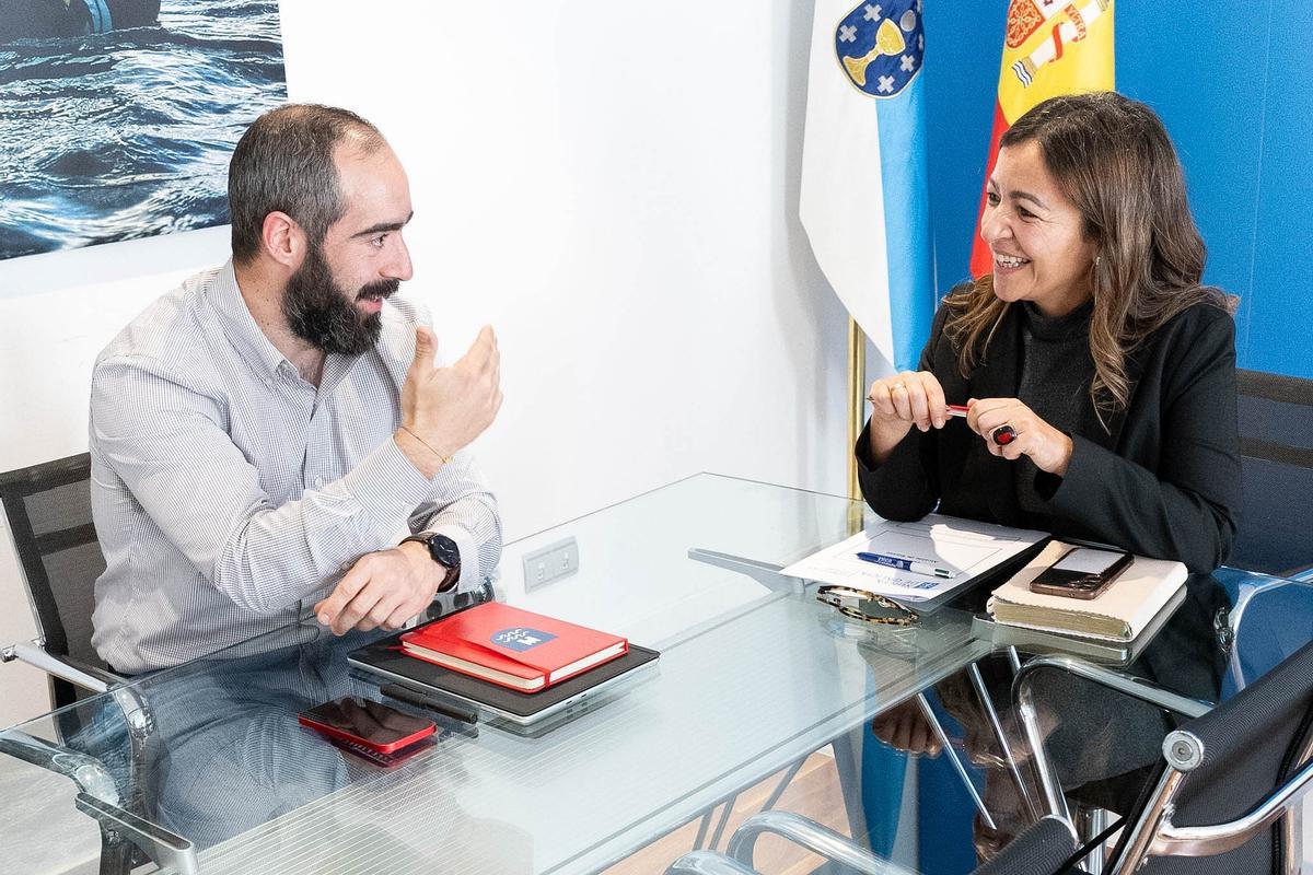 Julián Bustelo e Marta Villaverde na reunión celebrada en Santiago.