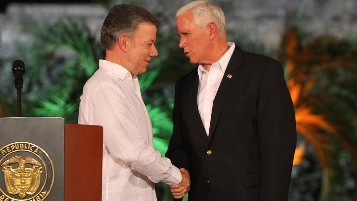 Santos (izquierda) y Pence, en Cartagena (Colombia)