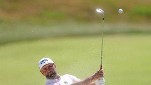 SOUTHAMPTON, NEW YORK - JUNE 16: Jon Rahm of Spain plays a shot from a bunker on the fifth hole during a practice round prior to the 126th U.S. OPEN at Shinnecock Hills Golf Club on June 16, 2026 in Southampton, New York. Christian Petersen/Getty Images/AFP (Photo by Christian Petersen / GETTY IMAGES NORTH AMERICA / Getty Images via AFP)