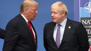 HERTFORD, ENGLAND - DECEMBER 04: US President Donald Trump and British Prime Minister Boris Johnson onstage during the annual NATO heads of government summit on December 4, 2019 in Watford, England. France and the UK signed the Treaty of Dunkirk in 1947 in the aftermath of WW2 cementing a mutual alliance in the event of an attack by Germany or the Soviet Union. The Benelux countries joined the Treaty and in April 1949 expanded further to include North America and Canada followed by Portugal, Italy, Norway, Denmark and Iceland. This new military alliance became the North Atlantic Treaty Organisation (NATO). The organisation grew with Greece and Turkey becoming members and a re-armed West Germany was permitted in 1955. This encouraged the creation of the Soviet-led Warsaw Pact delineating the two sides of the Cold War. This year marks the 70th anniversary of NATO. (Photo by Steve Parsons-WPA Pool/Getty Images)