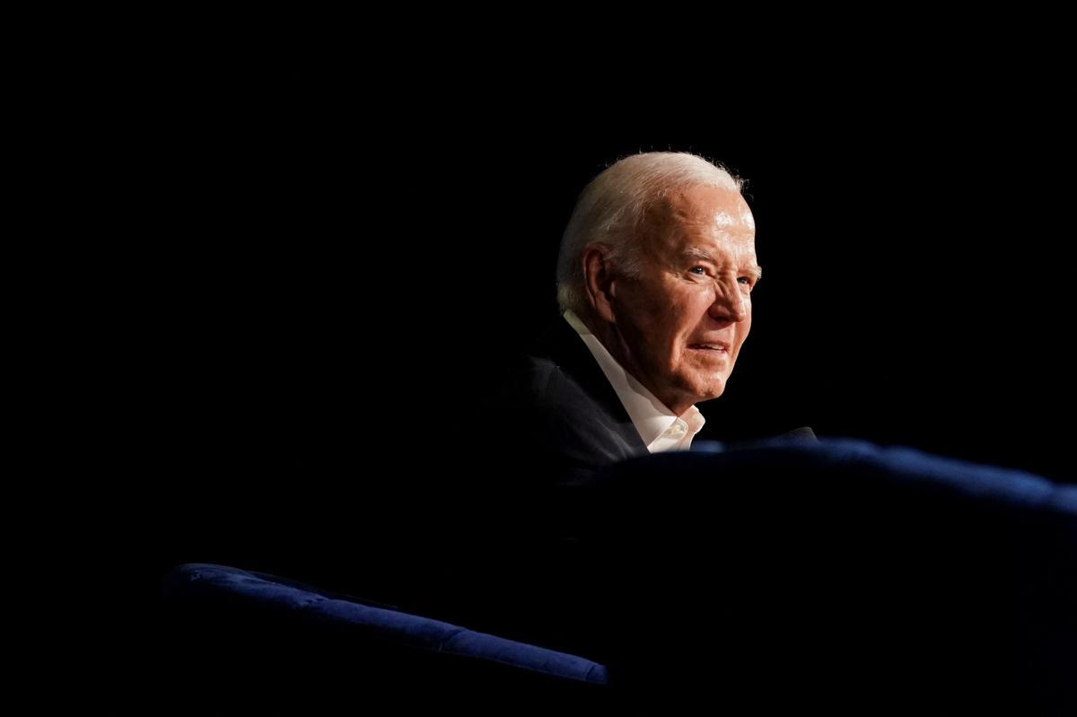 U.S. President Joe Biden takes part in a conversation with former U.S. President Barack Obama (not pictured) during a star-studded campaign fundraiser at the Peacock Theater in Los Angeles, California, U.S., June 15, 2024. REUTERS/Kevin Lamarque