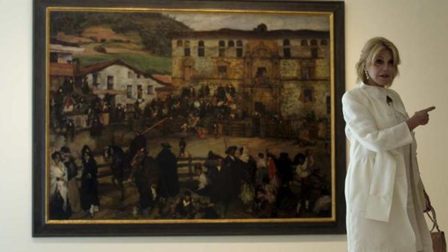 La baronesa junto al cuadro Corrida de toros en Eibar del autor Zuloaga y Zabaleta