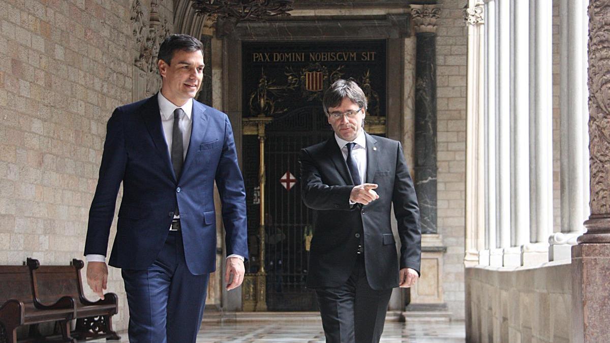 Pedro Sánchez y Carles Puigdemont.