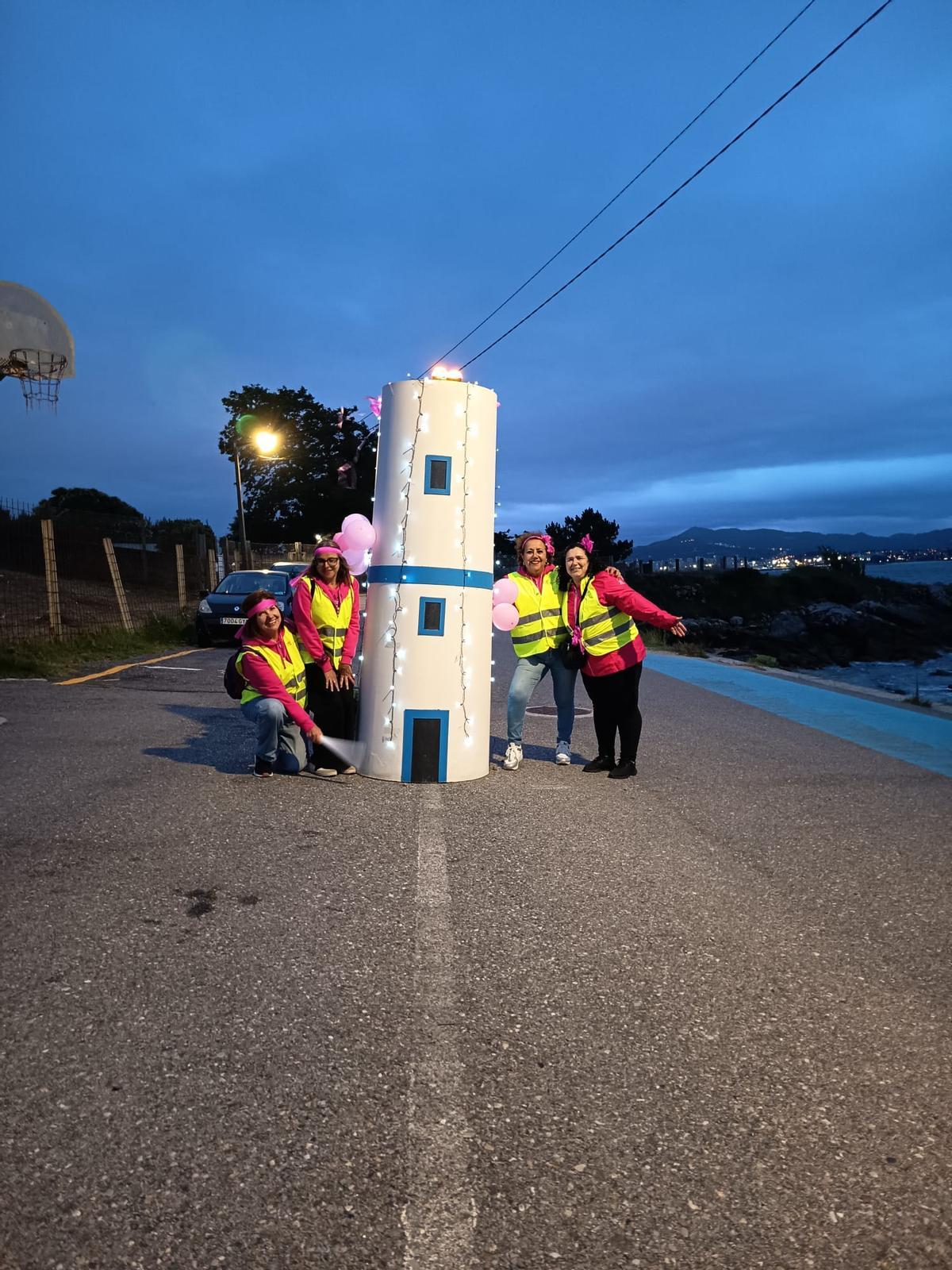 Más de 1.300 personas alumbran de rosa Cangas