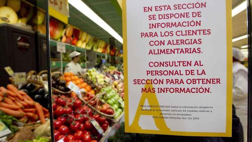Cartel colocado en un supermercado en Asturias para cumplir la normativa.