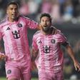Inter Miami forward Lionel Messi, right, celebrates with Luis Suarez, left, after scoring a goal during the second half of an MLS soccer match against Nashville SC, Saturday, July 12, 2025, in Fort Lauderdale, Fla. (AP Photo/Lynne Sladky)