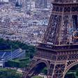 Los anillos olímpicos, en la Torre Eiffel