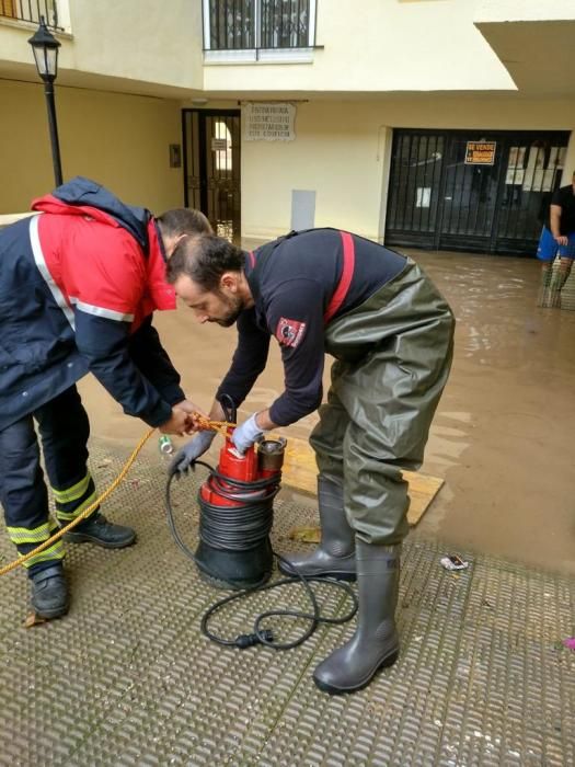 Desperfectos e inundaciones generadas por la tromba de lluvia que ha descargado en Torrevieja