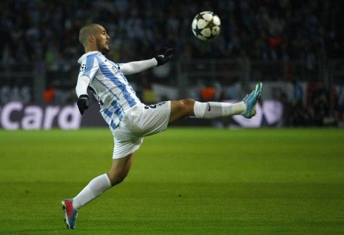 Malaga's Isco controls the ball during Champions League quarter-final second leg soccer match against Borussia Dortmund in Dortmund
