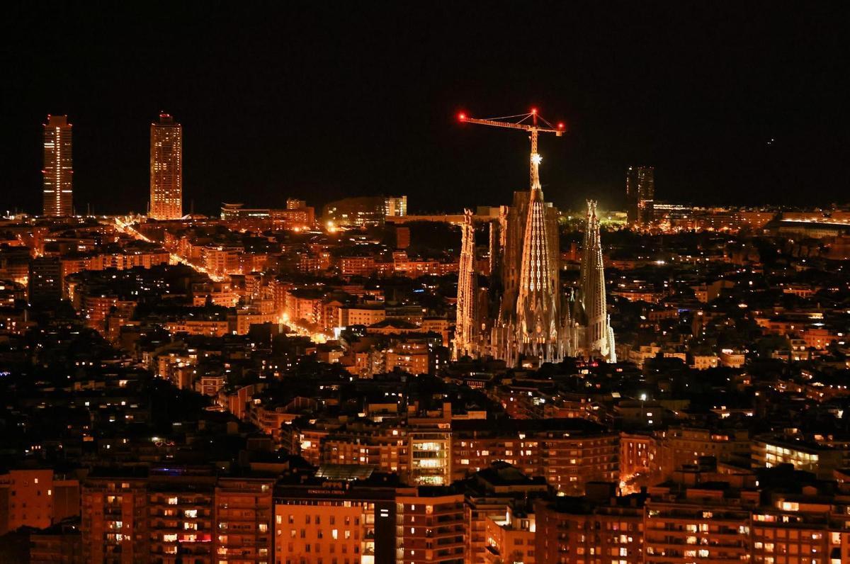 Star is lit on Sagrada Familia tower on Immaculate Conception Day, in Barcelona