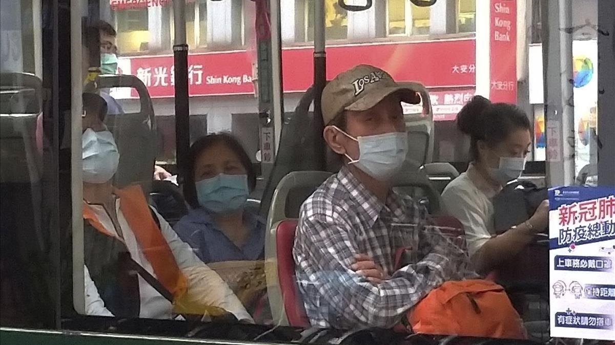 zentauroepp53185649 people wear face masks to protect against the spread of the 200426175243