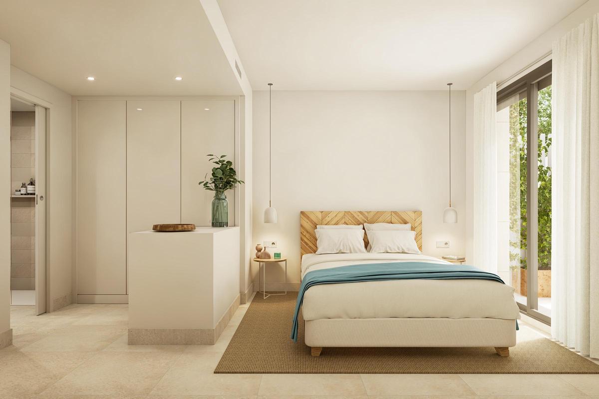Dormitorio principal en uno de los apartamentos de Anahata Ibiza Homes.