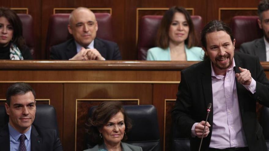 Pedro Sánchez, Carmen Calvo y Pablo Iglesias.