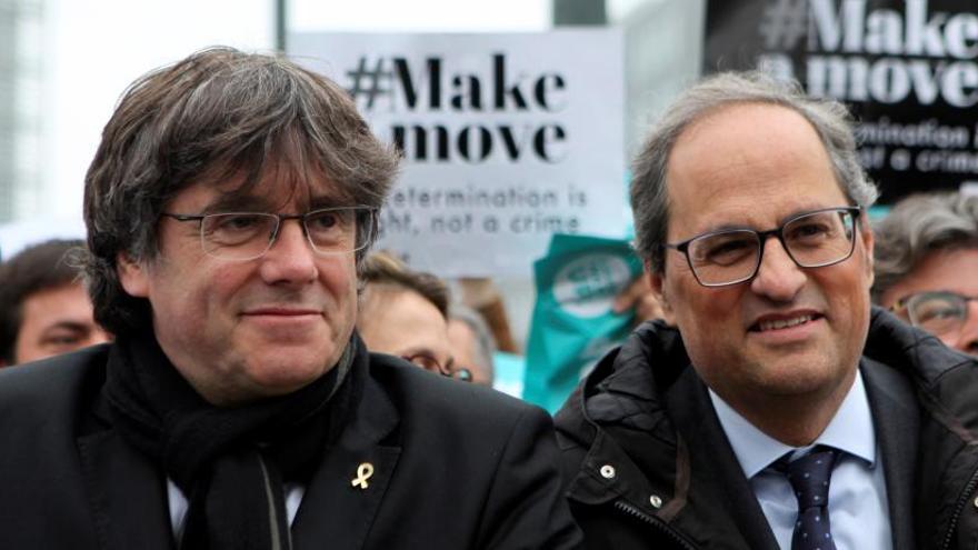 Puigdemont y Torra durante una protesta en Bruselas.