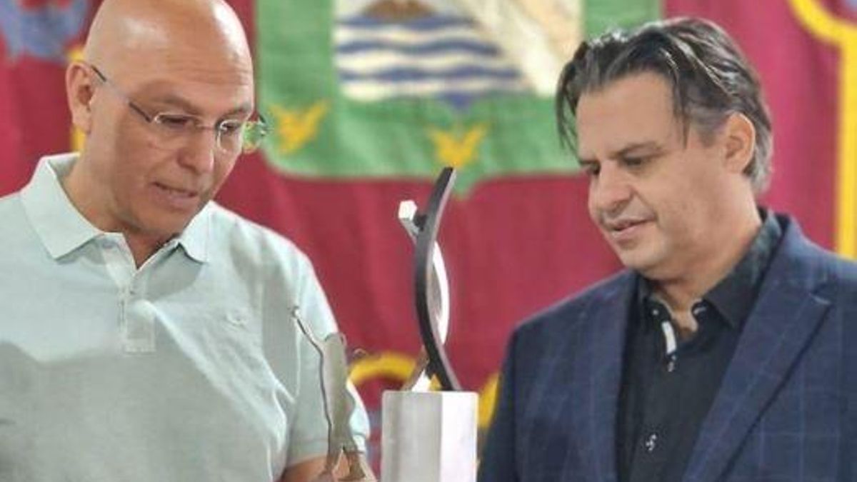 El secretario de Organización del PSOE en Güímar, a la izquierda, junto al todavía alcalde.