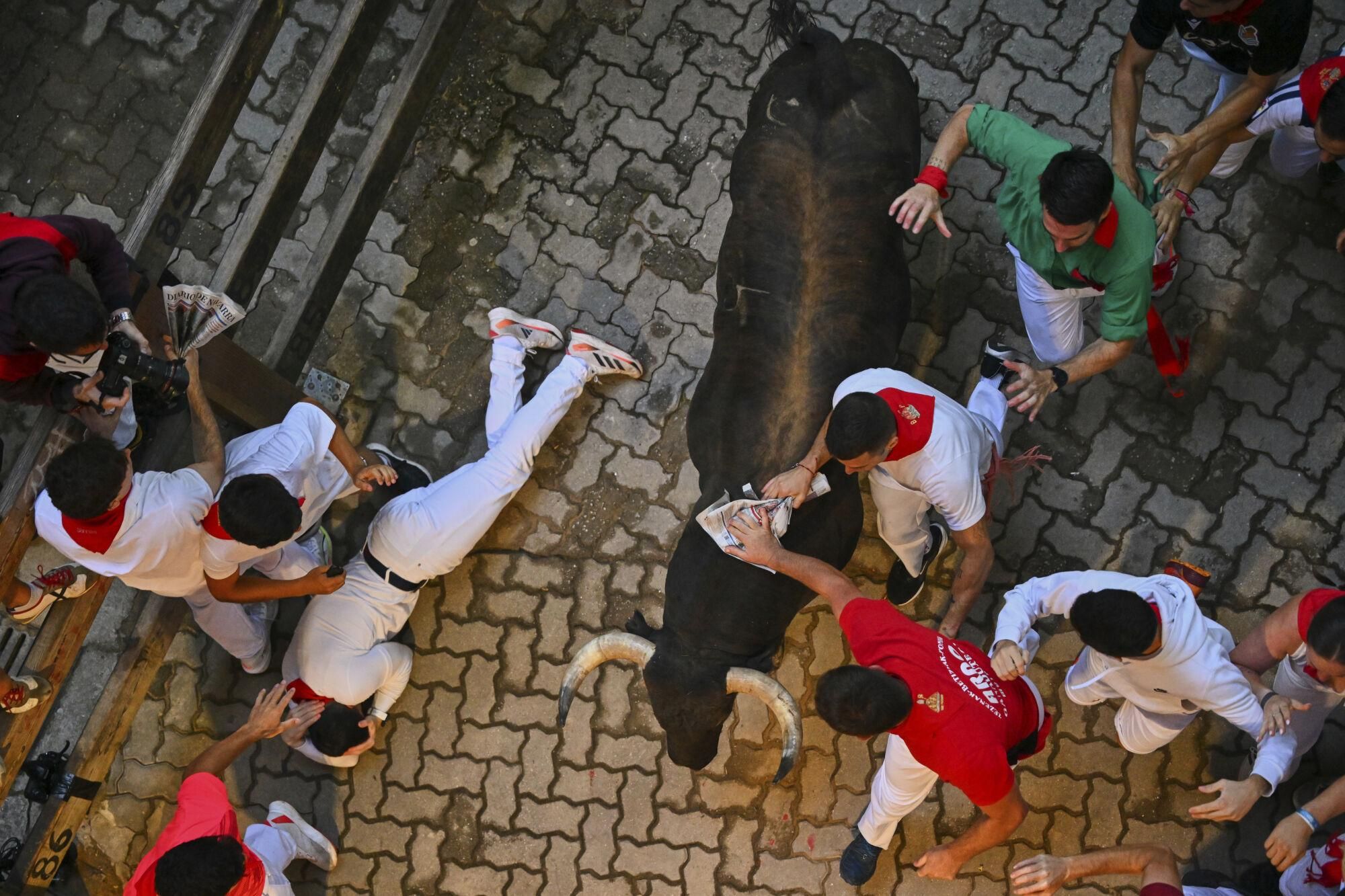El quinto encierro de los Sanfermines 2025, en imágenes.