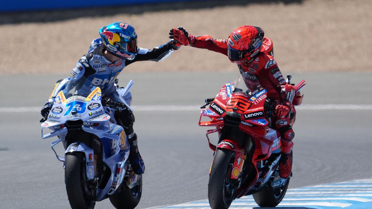 Los pilotos Marc y Alex Márquez.