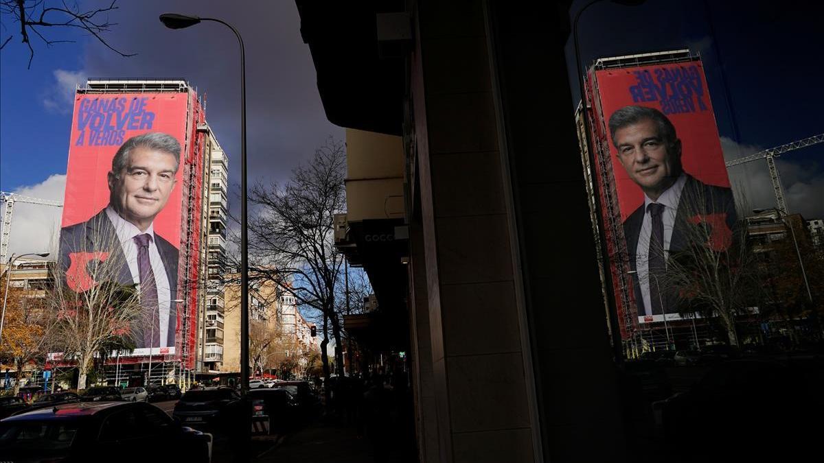 A giant electoral poster of FC Barcelona presidential hopeful Joan Laporta is seen on a building next to the Santiago Bernabeu Stadium in Madrid  Spain - December 15  2020  REUTERS Juan Medina