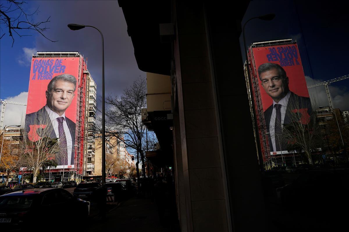 A giant electoral poster of FC Barcelona presidential hopeful Joan Laporta is seen on a building next to the Santiago Bernabeu Stadium in Madrid  Spain - December 15  2020  REUTERS Juan Medina