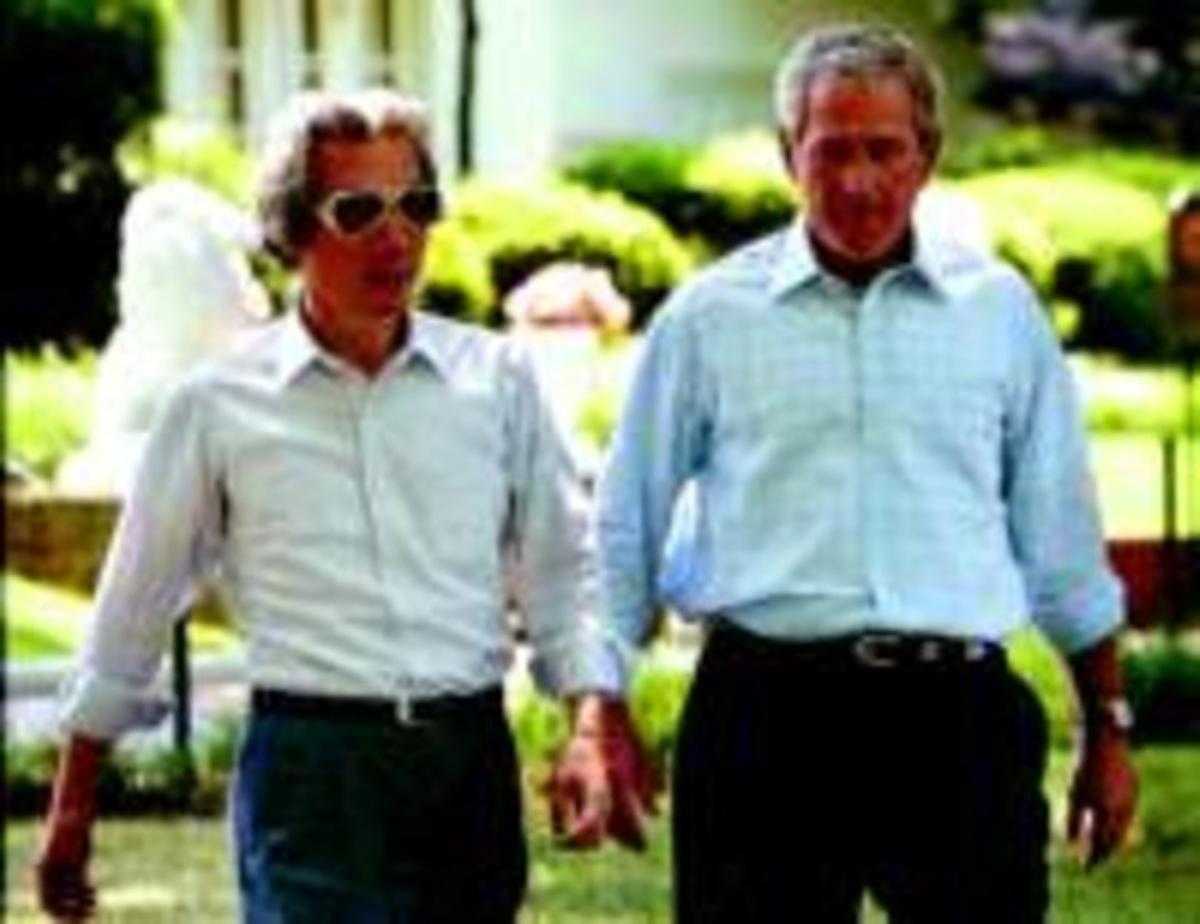 Junichiro Koizumi i George Bush, sense corbata, el juny del 2006.