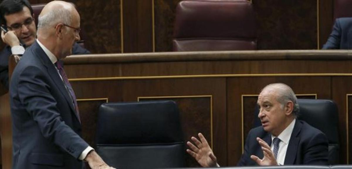 El portaveu de CiU al Congrés, Josep Antoni Duran Lleida, i el ministre de l’Interior, Jorge Fernández Díaz, el 12 de març, a Madrid.