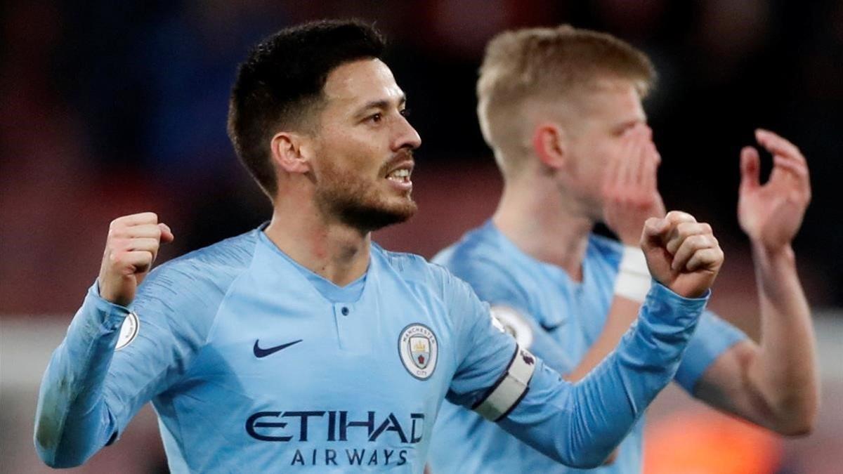 David Silva y De Bruyne festejan la victoria en campo del Bournemouth.