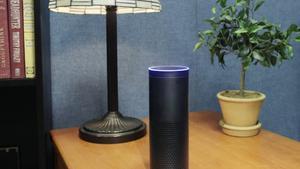 FILE - This July 29, 2015, file photo made in New York shows Amazon’s Echo, a digital assistant that continually listens for commands such as for a song, a sports score or the weather. Starting Thursday, March 17, 2016, Amazon’s voice assistant will tell you how well you slept and how much more exercise you need, at least if you have a Fitbit fitness tracker and an Alexa-compatible device, such as Amazon’s Echo speaker and Fire TV streaming devices. (AP Photo/Mark Lennihan, File)