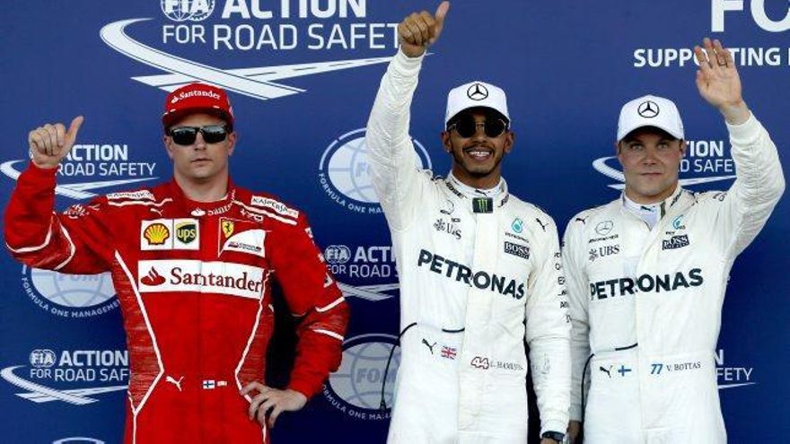 Raikkonen al costat de Hamilton i Bottas després de la classificació