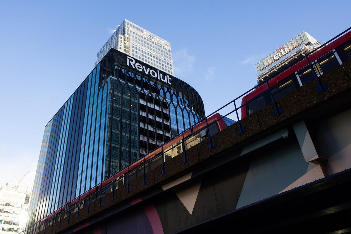 The Revolut Ltd. headquarters in Canary Wharf, London, UK, on Tuesday, Dec. 2, 2025. Measures in the UK budget to attract more companies to the London Stock Exchange will help the bourse compete against the Nasdaq for financial technology listings, the chair of challenger bank Revolut Ltd. said. Photographer: Chris Ratcliffe/Bloomberg