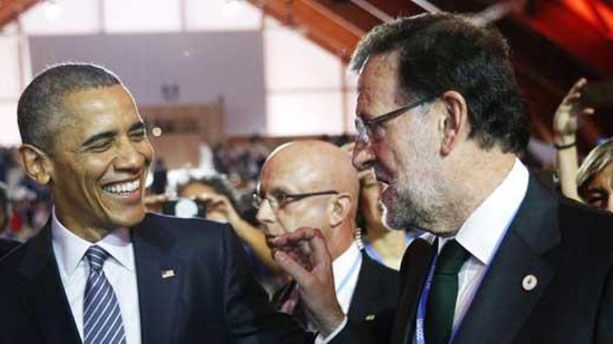 Rajoy, con Barack Obama, en la cumbre de París.