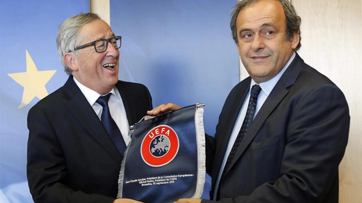 Juncker y Platini en un acto