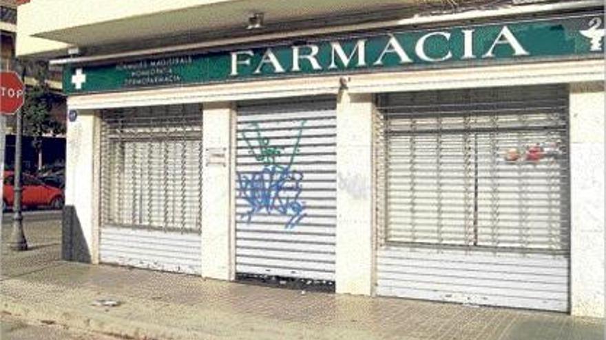 Farmacia de Valencia donde el presunto atracador hirió a un guardia civil de paisano.