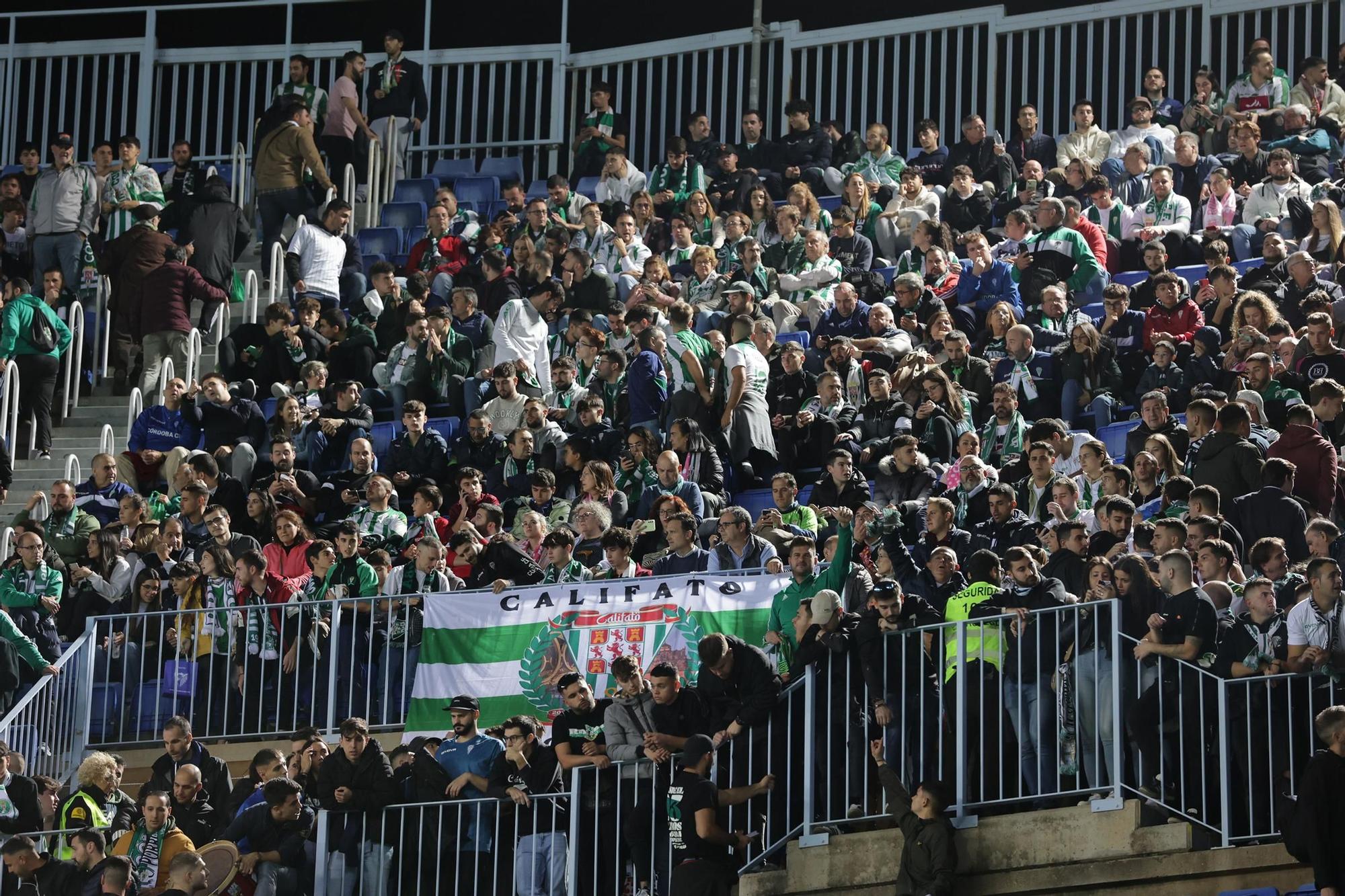 Málaga CF - Córdoba CF | Las imágenes de la afición cordobesista en el derbi en La Rosaleda