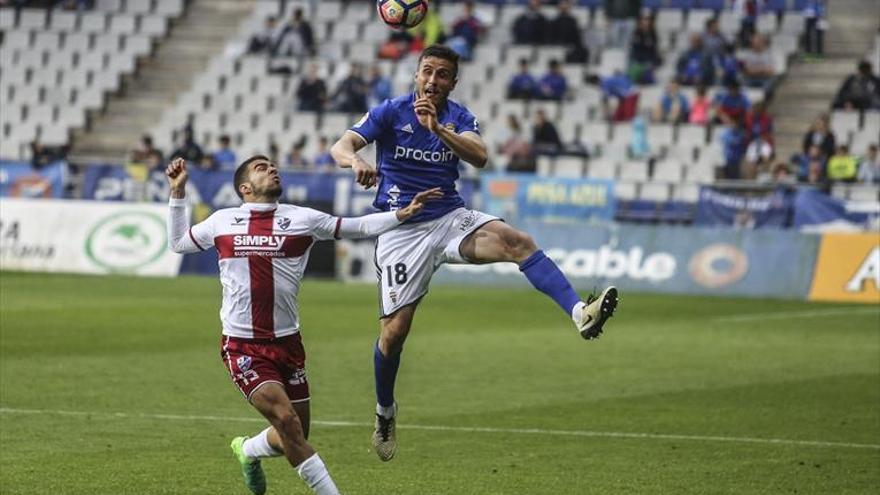 Empate con épica del Huesca en el Tartiere