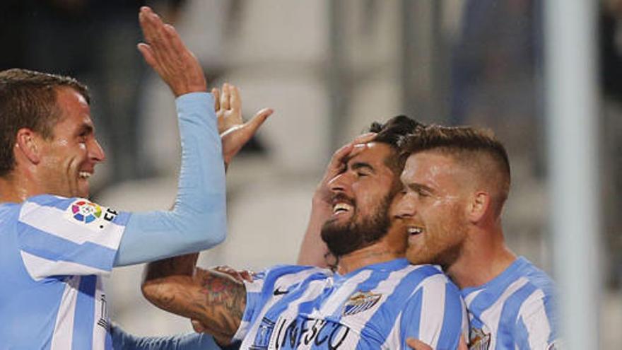 El delantero del Málaga Samuel García Sanchez celebra su gol.