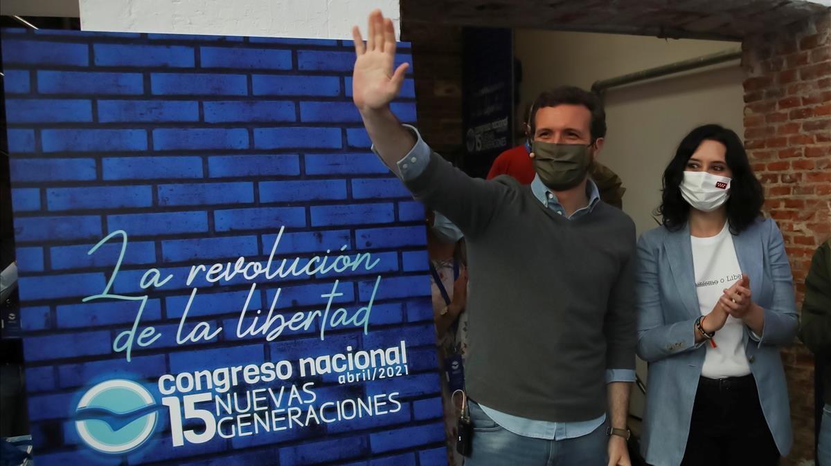 MADRID  10 04 2021 - El presidente del PP  Pablo Casado y la presidenta de la Comunidad de Madrid  Isabel Diaz Ayuso  a su llegada a la inauguracion del Congreso de Nuevas Generaciones del PP celebrada este sabado en Madrid  EFE David Fernandez