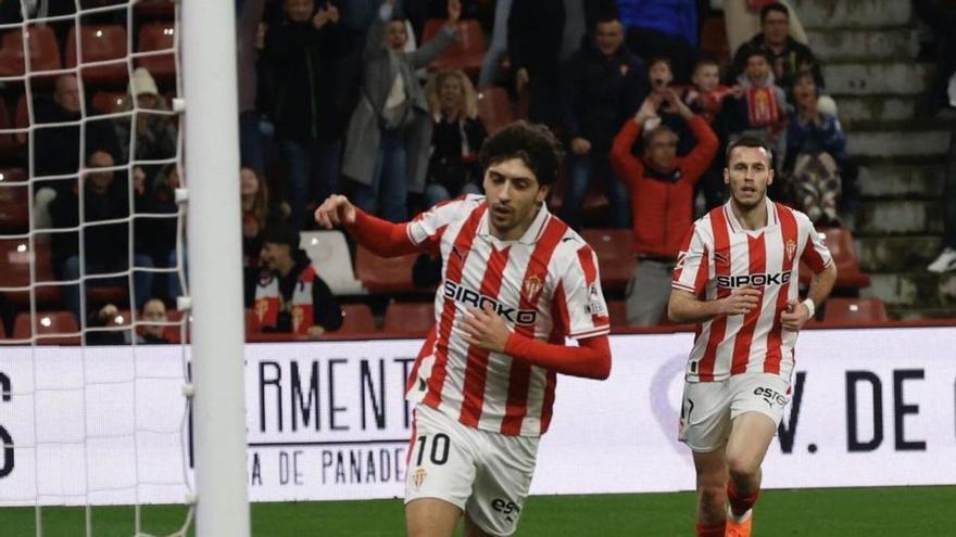 Gelabert celebrando el gol ante el Granada con Dubasin al fondo.