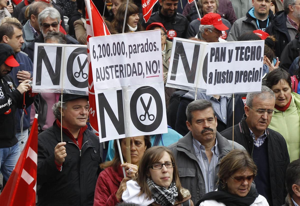 Pancartas de Martín Sagrera, en un marcha por el Primero de Mayo.